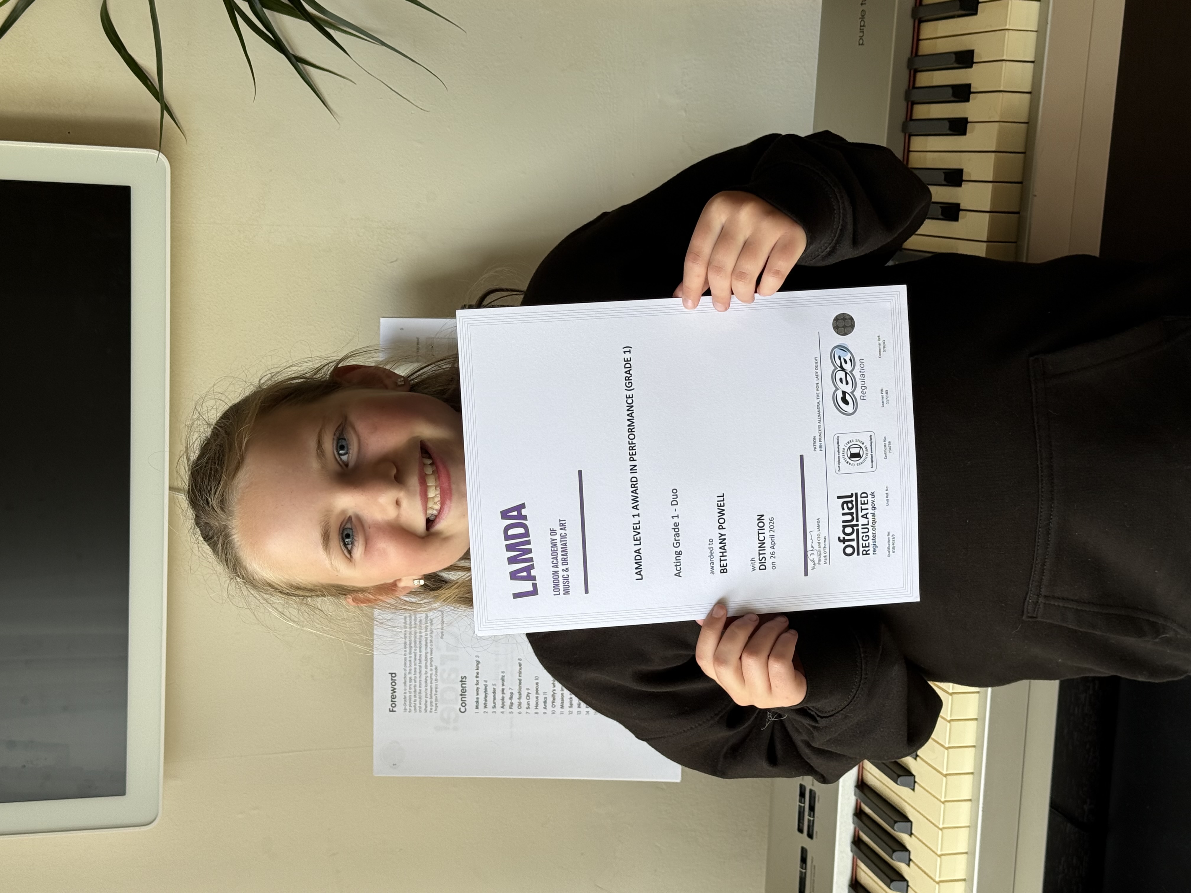 Bethany Powell with her LAMDA Distinction certificate