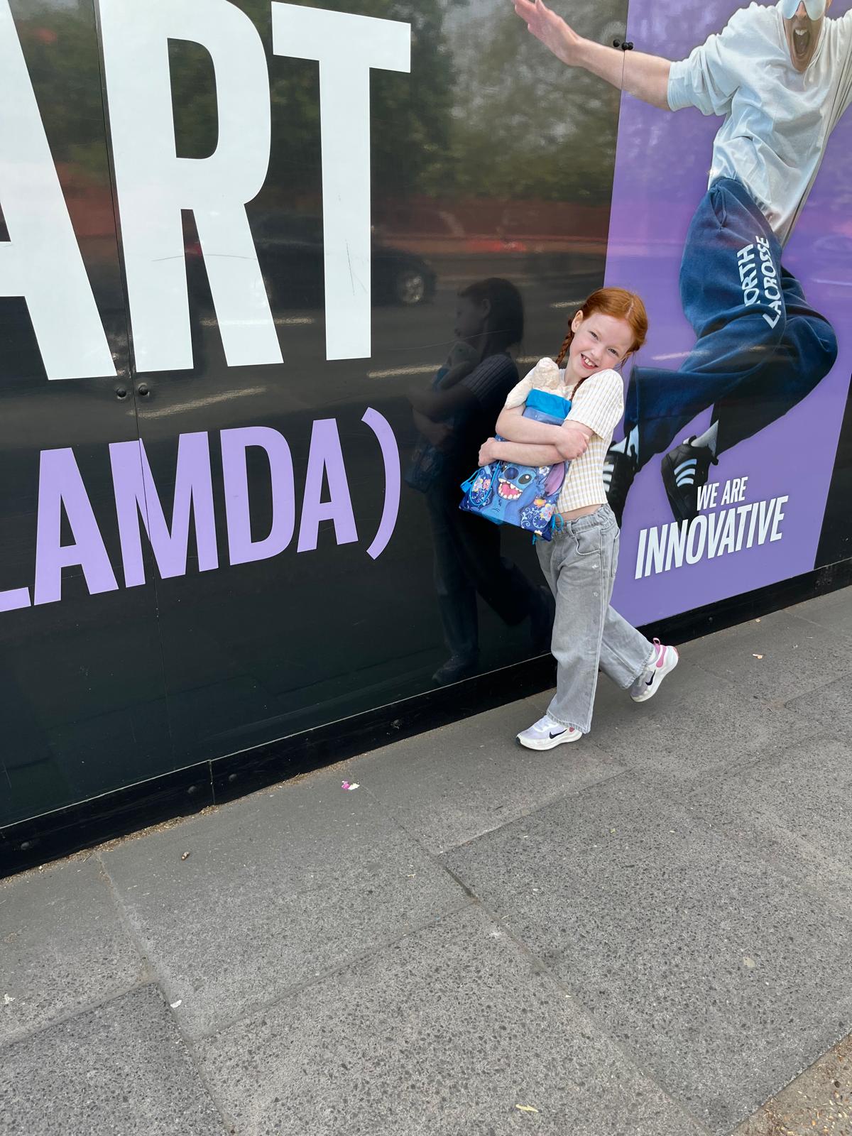 Verse Arts student outside the LAMDA building